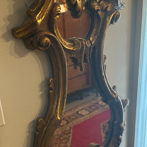 Antique gold mirror, curved and decorative