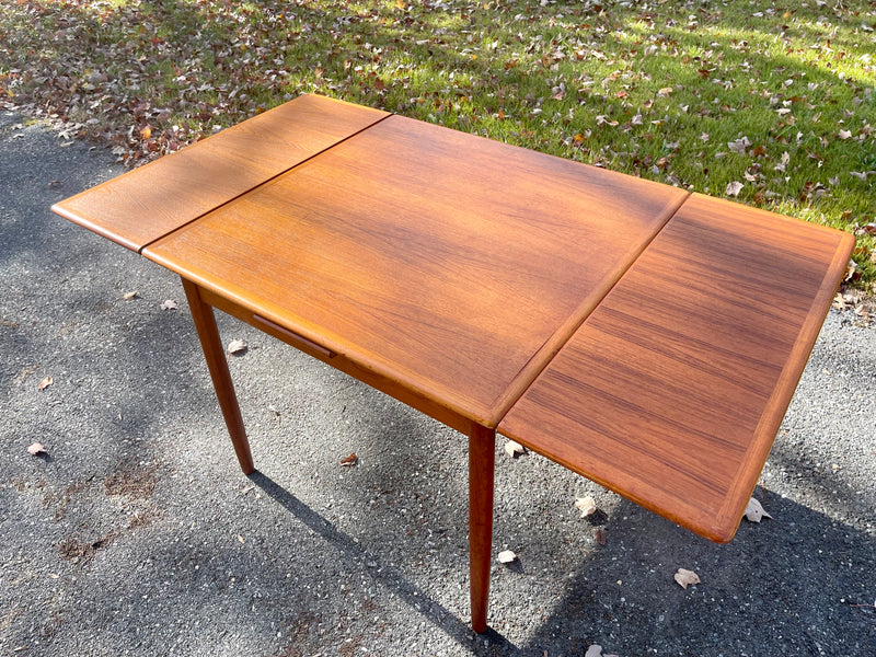 Scandinavian Modern Teak Petite Dining Table with Two Leaves