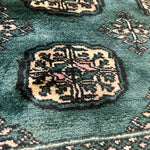 Hand-knotted Pakistani Bokhara Teal Area Rug