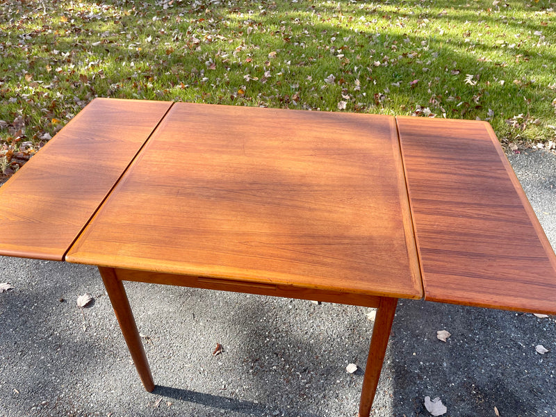 Scandinavian Modern Teak Petite Dining Table with Two Leaves